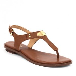 MK plate thong sandals